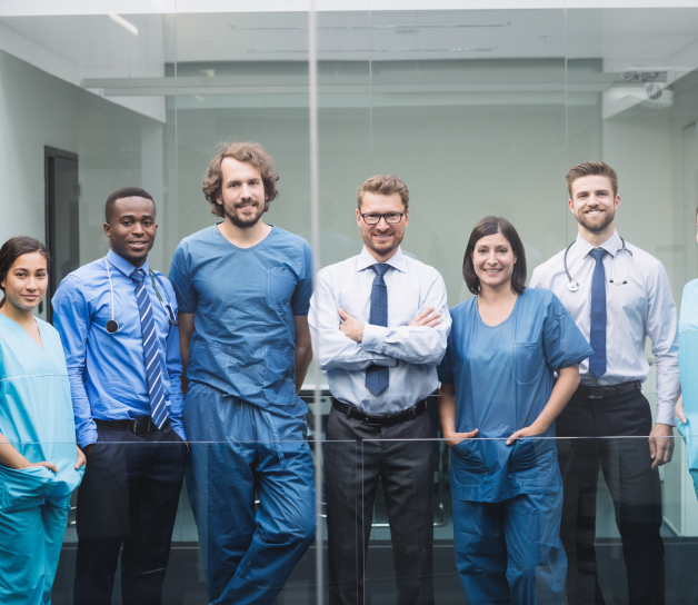 team-doctors-standing-corridor 1